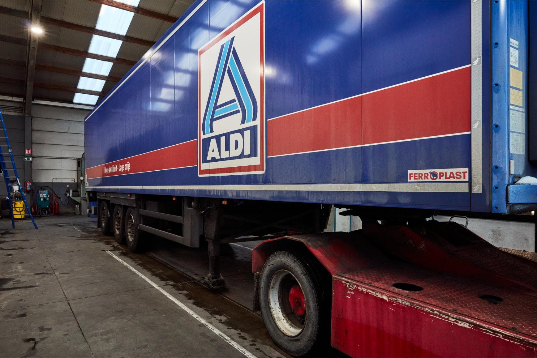 A blue ALDI refrigerated trailer in the Westcool workshop